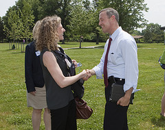 Financial advisor shaking hands with a client based on ClientWise tips and ideas