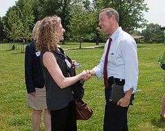 Financial advisor shaking hands with a client based on ClientWise tips and ideas